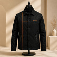 NYK Orange Line - A Study in Black Panel Confidence